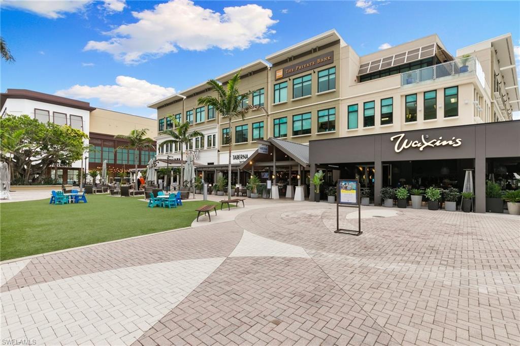 9115 Strada Place, Unit 5406 Naples, FL 34108 - Photo 36 of 50 a front view of a building with street view