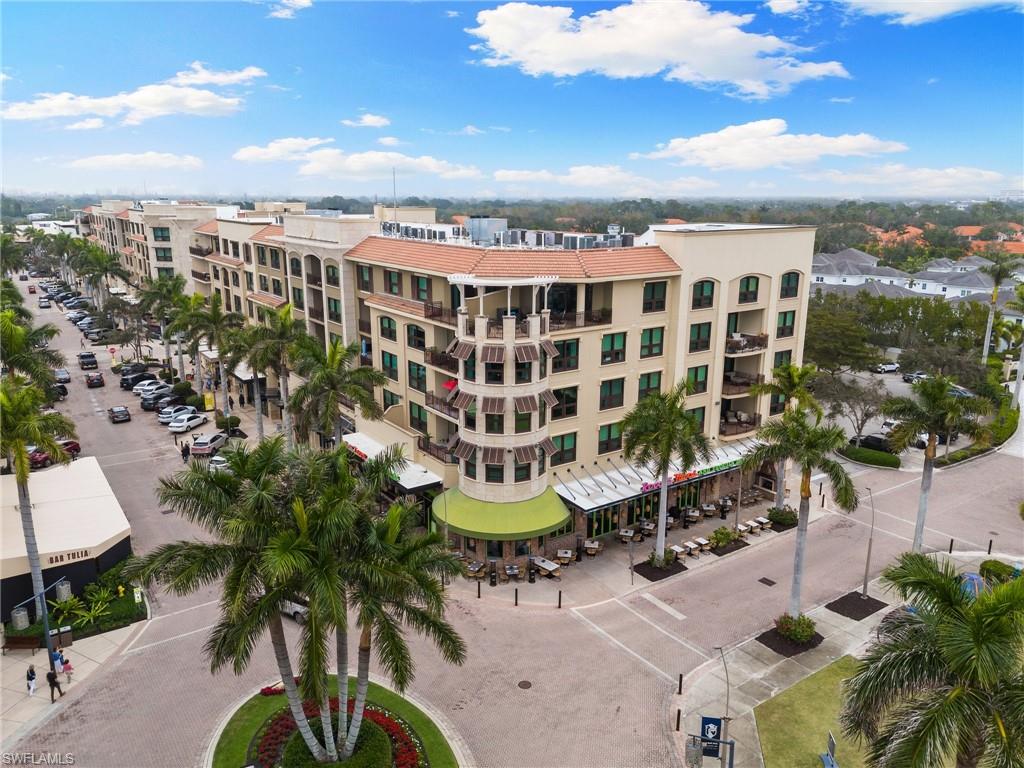 9115 Strada Place, Unit 5406 Naples, FL 34108 - Photo 38 of 50 a view of a city with tall buildings