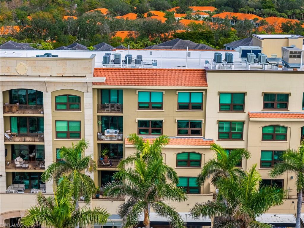 9115 Strada Place, Unit 5406 Naples, FL 34108 - Photo 50 of 50 a front view of a multi story building