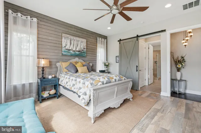 a bathroom with double vanity sink and a mirror