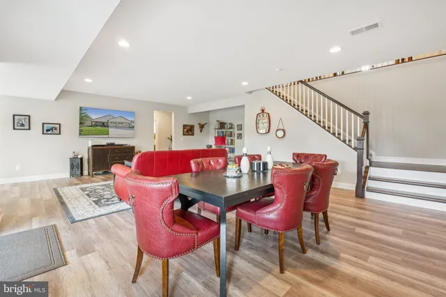 a bathroom with a sink vanity and a mirror