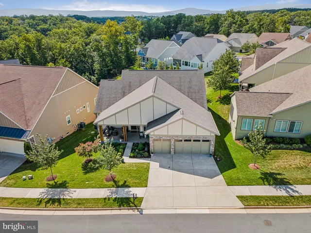 a view of a garden with outdoor seating