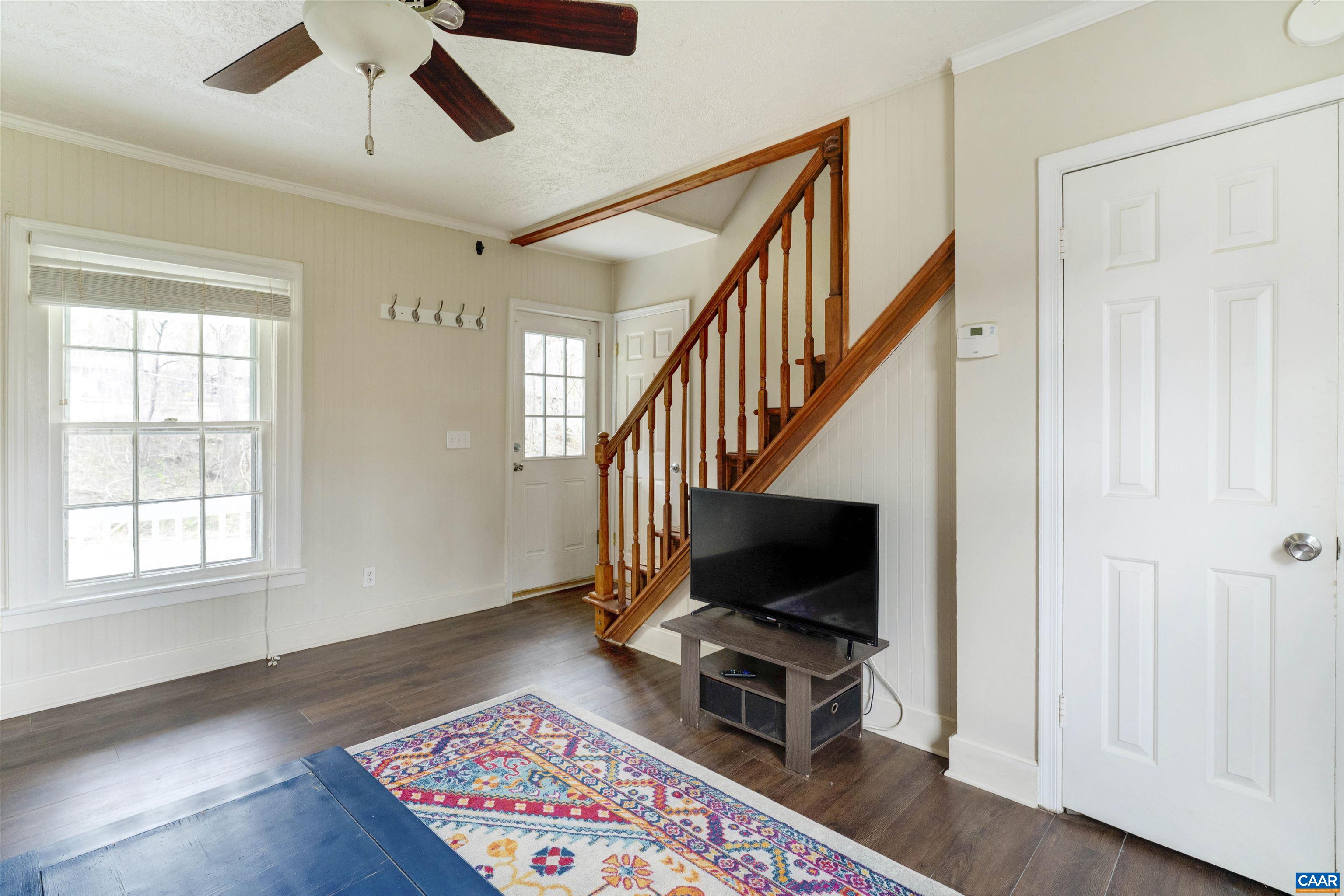 1625 Grove St Extension Charlottesville, VA 22903 - Photo 4 of 24 a view of an empty room window and wooden floor