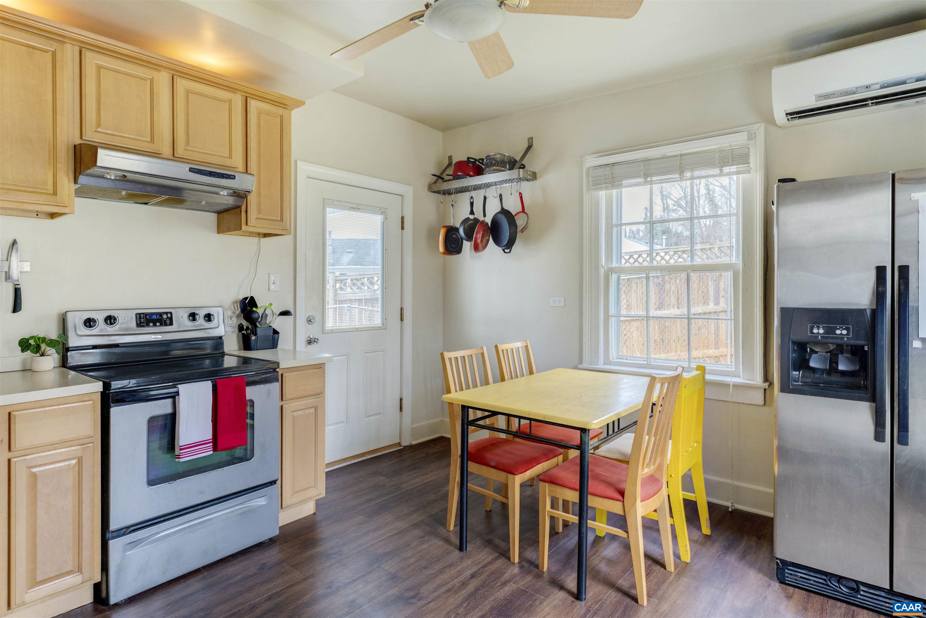 1625 Grove St Extension Charlottesville, VA 22903 - Photo 10 of 24 a kitchen with stainless steel appliances granite countertop a stove and refrigerator