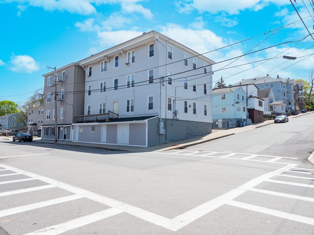 a view of a building with a street