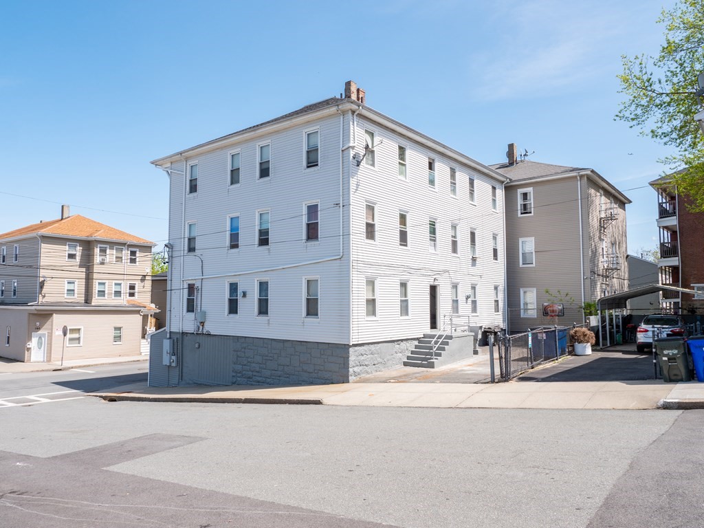 159 Nashua Street Fall River, MA 02721 - Photo 2 of 15 a view of a building with a street