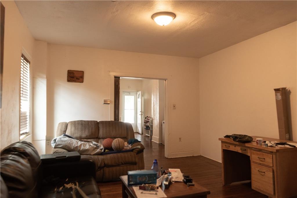 47-49 South S 5th Street Indiana, PA 15701 - Photo 14 of 14 a living room with furniture and a flat screen tv