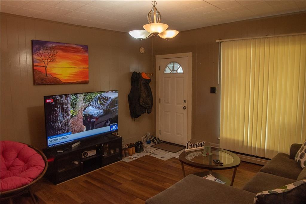 47-49 South S 5th Street Indiana, PA 15701 - Photo 4 of 14 a living room with furniture and a flat screen tv