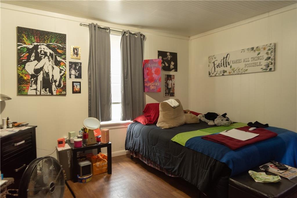 47-49 South S 5th Street Indiana, PA 15701 - Photo 9 of 14 a bedroom with a bed and a window