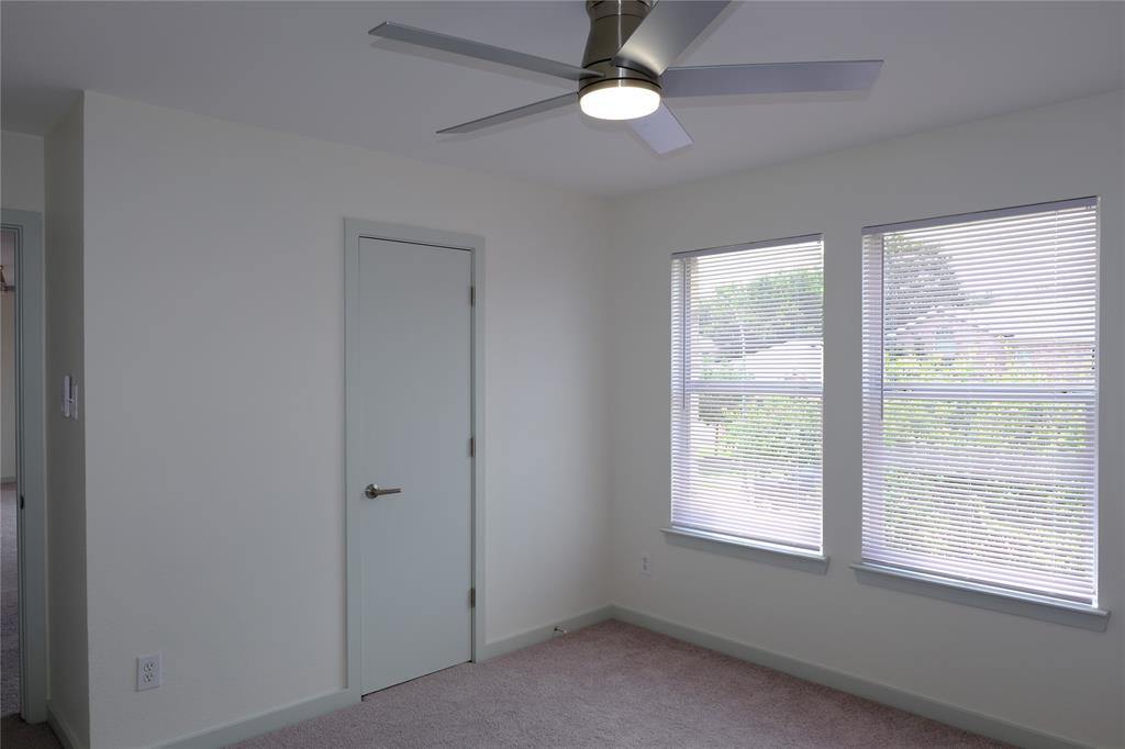3437 Caprock Ranch Road Fort Worth, TX 76262 - Photo 15 of 27 a view of an empty room with a window