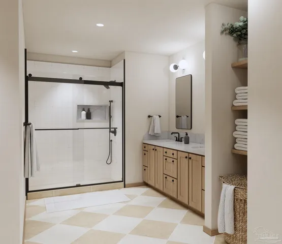 a spacious bathroom with a double vanity sink a mirror and a shower
