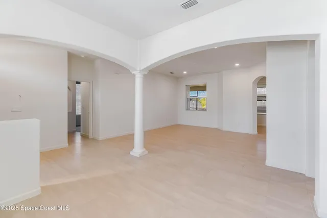 an empty room with a natural light