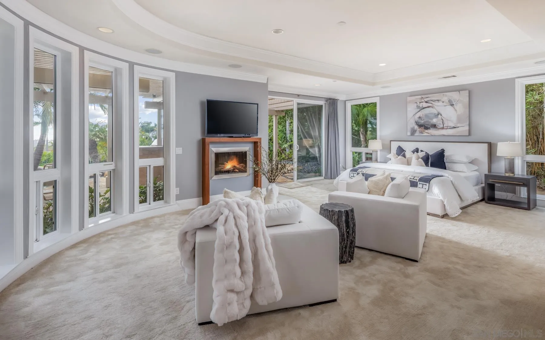 1650 Bella Laguna Court Encinitas, CA 92024 - Photo 16 of 41 a bed room with furniture and a flat screen tv