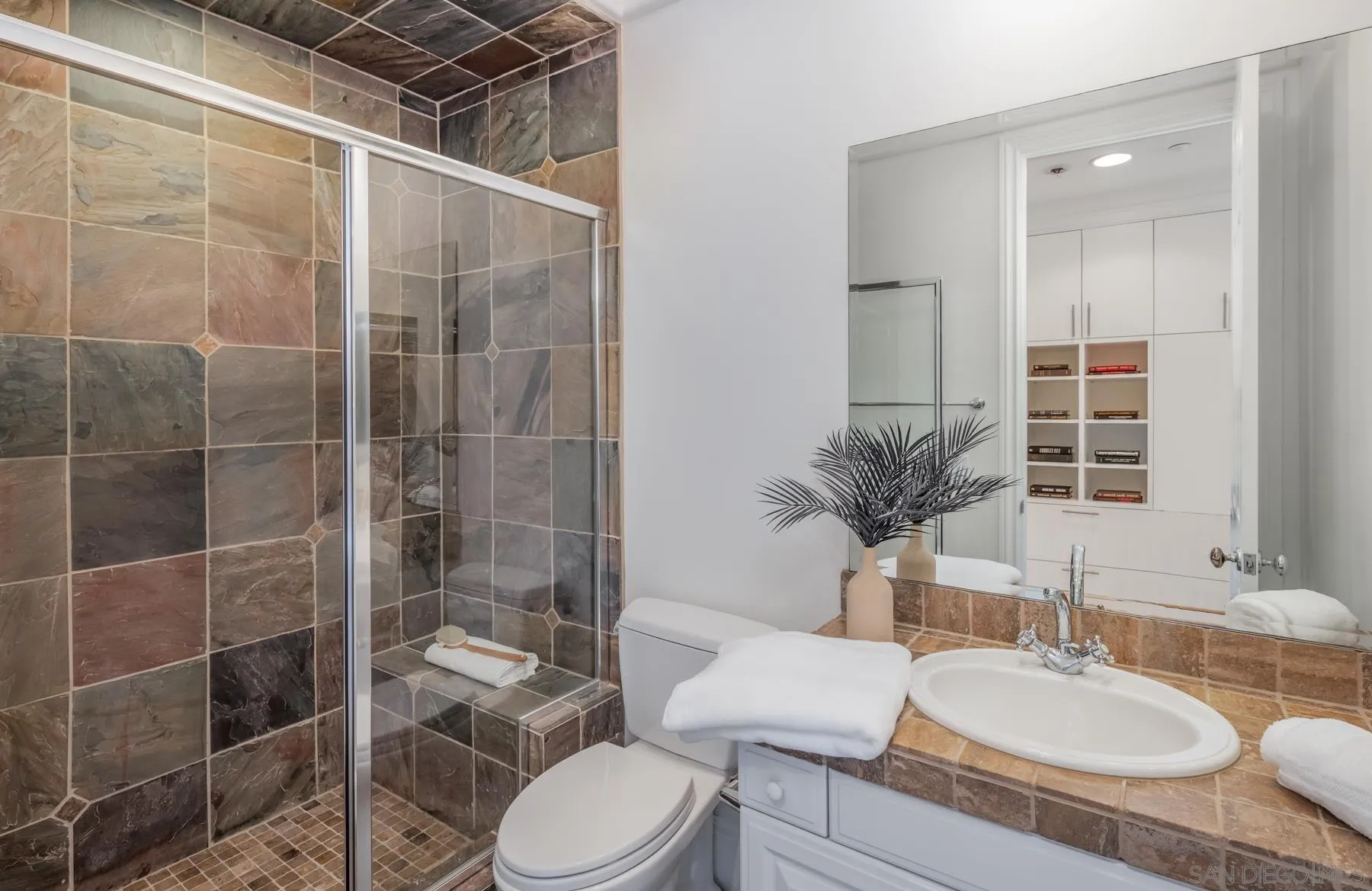 1650 Bella Laguna Court Encinitas, CA 92024 - Photo 25 of 41 a bathroom with a sink toilet and shower