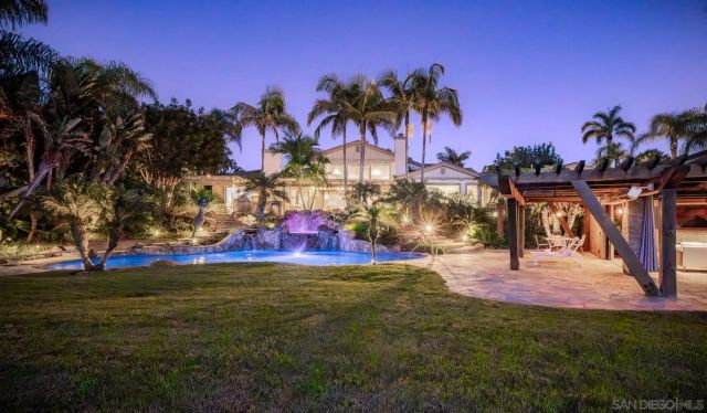 a view of a yard with a slide