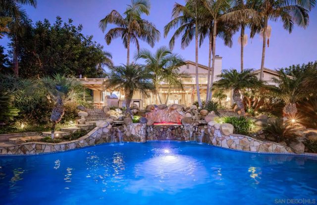 a view of outdoor space with palm trees