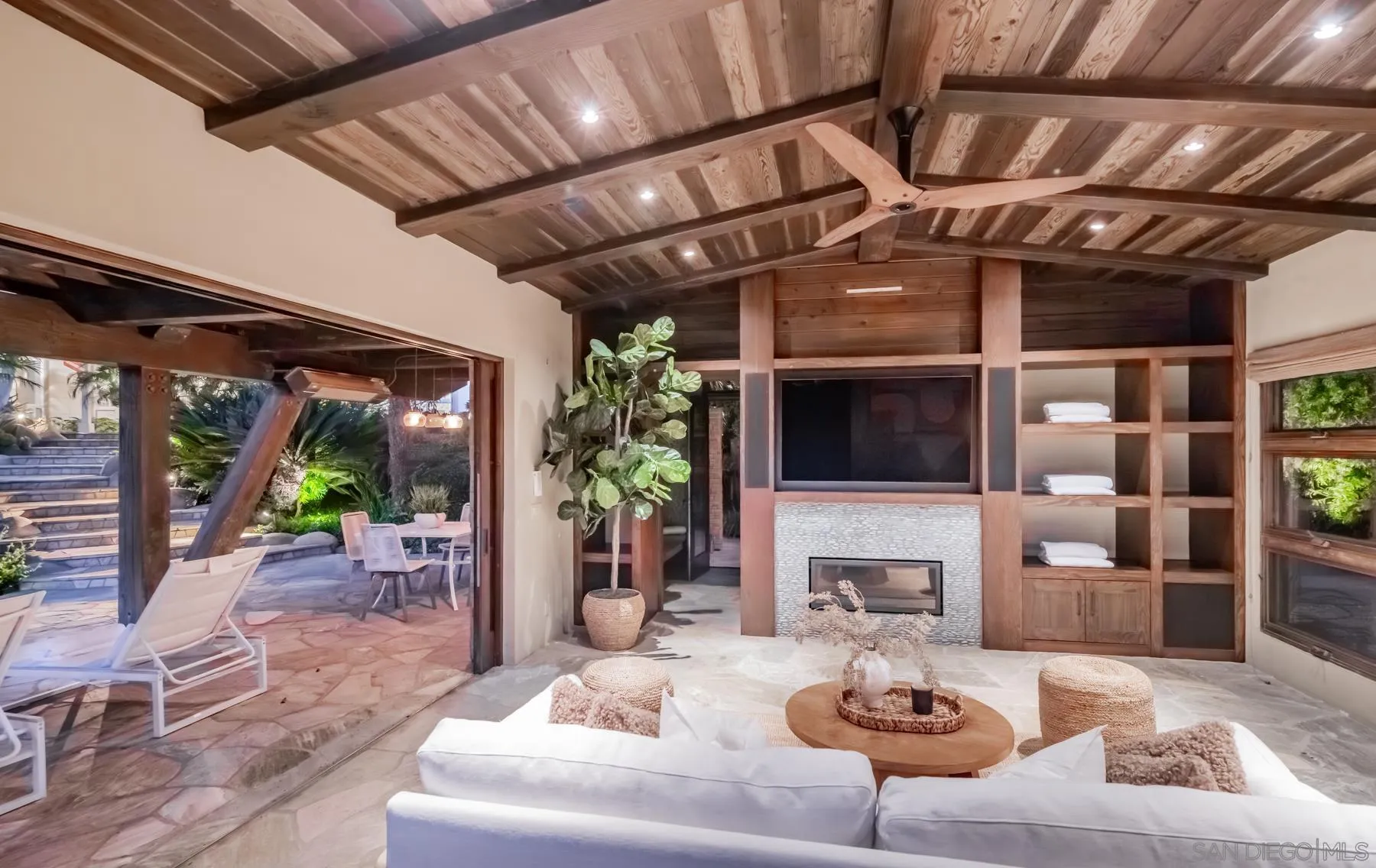 1650 Bella Laguna Court Encinitas, CA 92024 - Photo 31 of 41 a outdoor living space with patio furniture and a fireplace