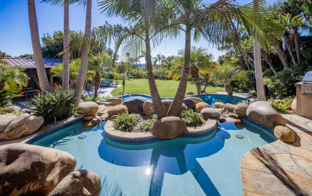 a outdoor living space with furniture and a potted plant