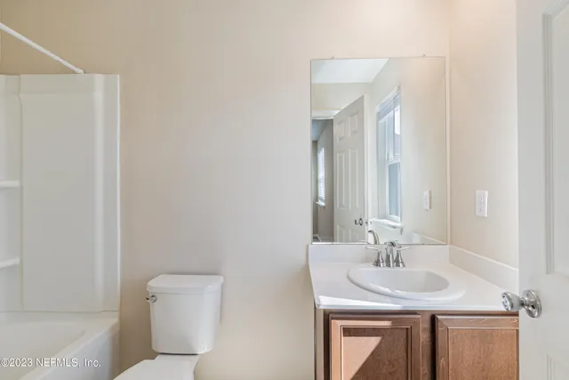 a bathroom with a sink and a toilet