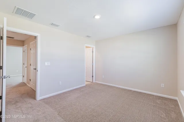 an empty room with an entryway