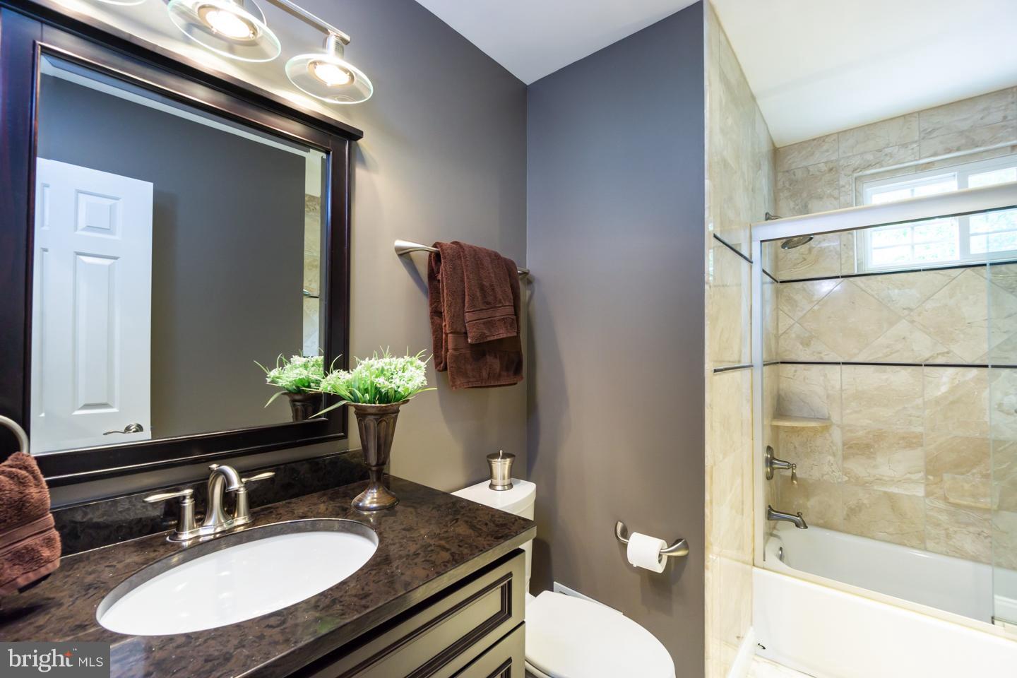 13367 Point Rider Lane Herndon, VA 20171 - Photo 22 of 30 Remodeled hall bathroom w/beautiful tile