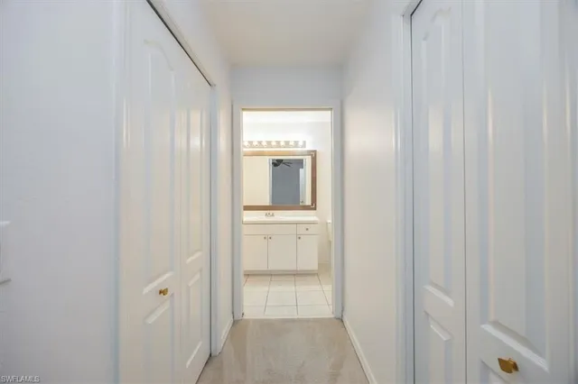 a bathroom with a sink and mirror