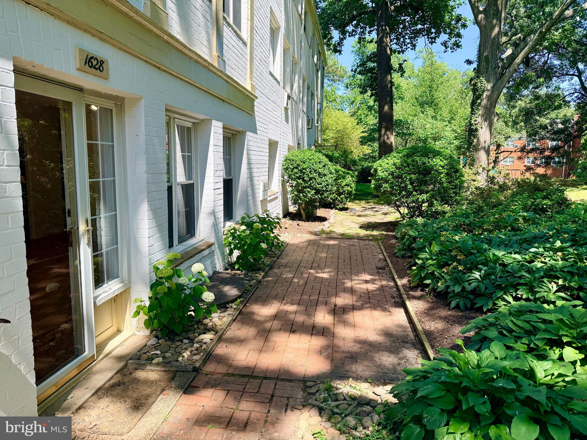 1628 Ripon Place Alexandria, VA 22302 - Photo 18 of 21 Beautiful patio with lush gardens