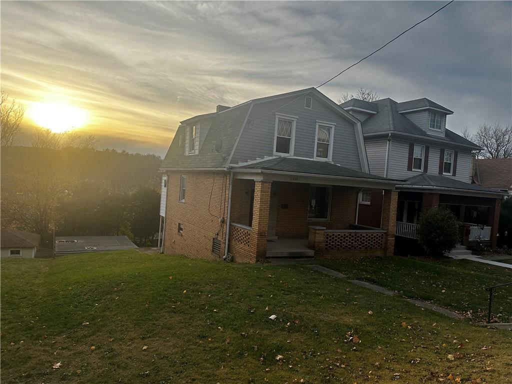 325 Elm Road Ambridge, PA 15003 - Photo 3 of 13 a house view with a garden space