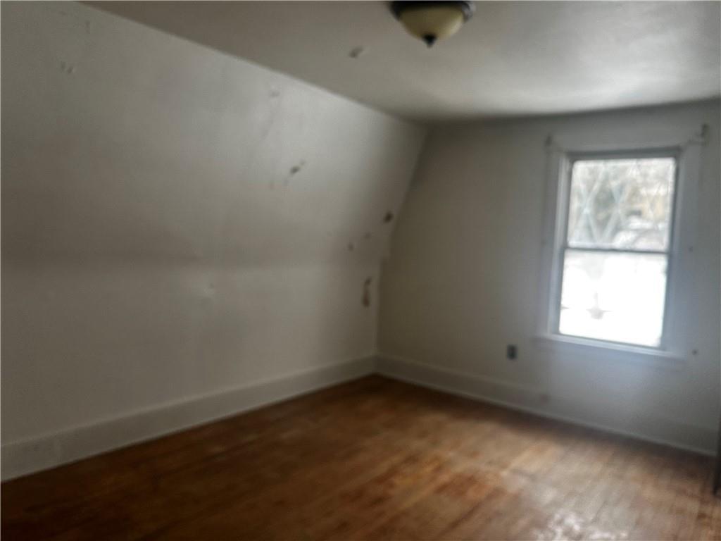 325 Elm Road Ambridge, PA 15003 - Photo 4 of 13 an empty room with a window