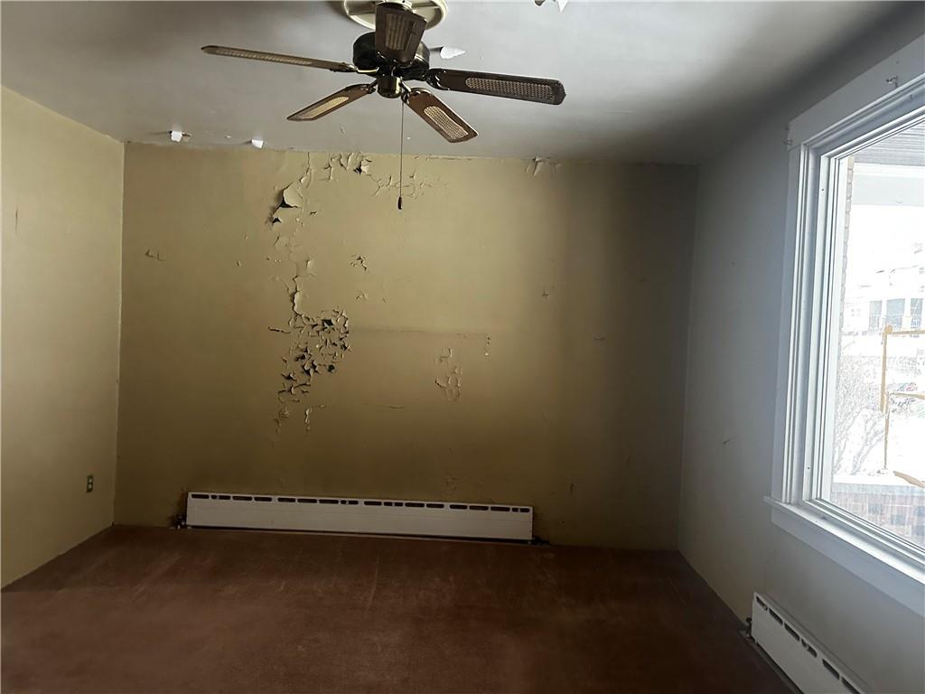 325 Elm Road Ambridge, PA 15003 - Photo 6 of 13 an empty room with a window