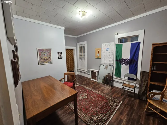 a view of a living room and dining room