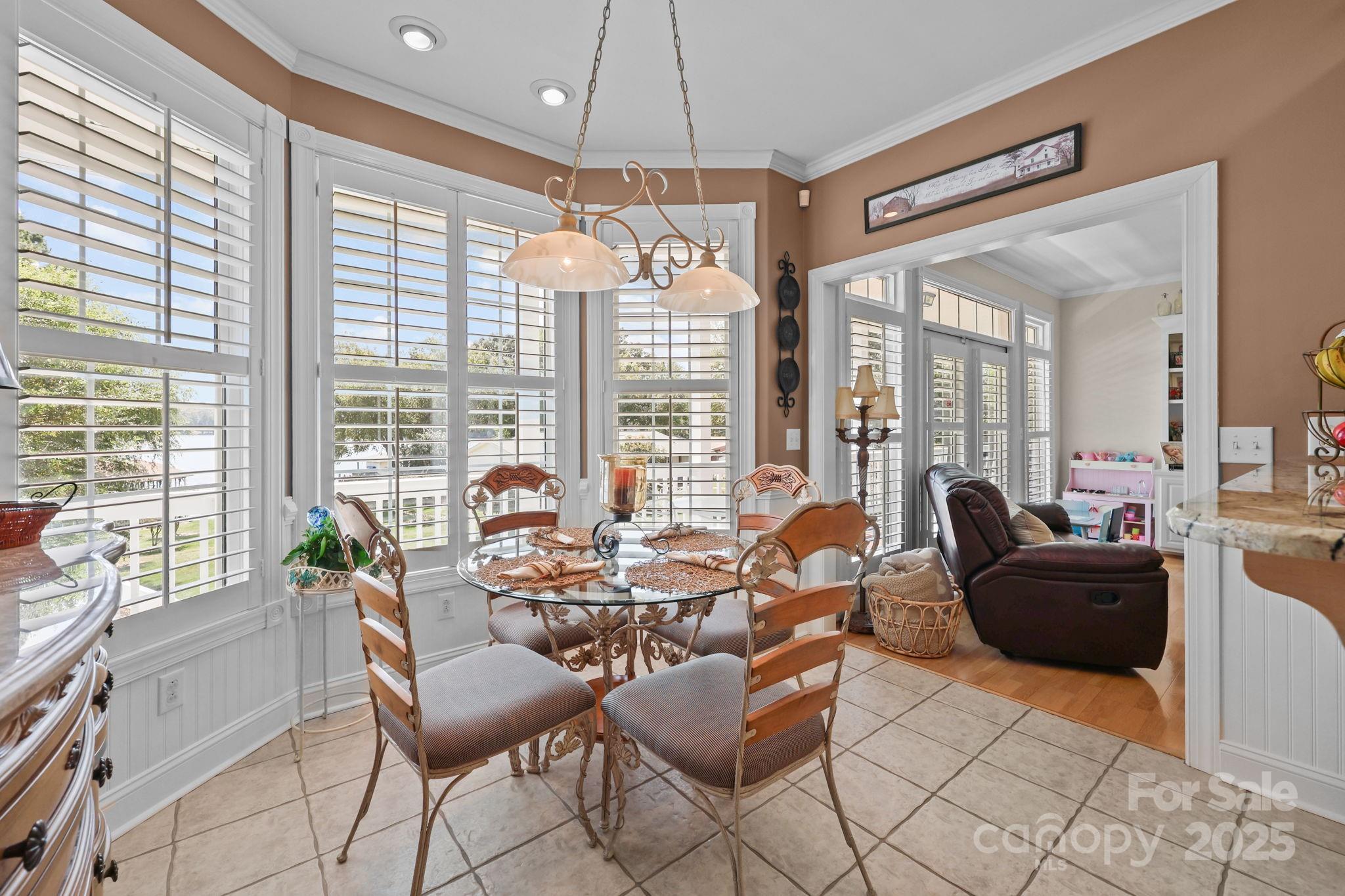 17200 Randalls Ferry Road Norwood, NC 28128 - Photo 17 of 48 a dining room with furniture and large windows