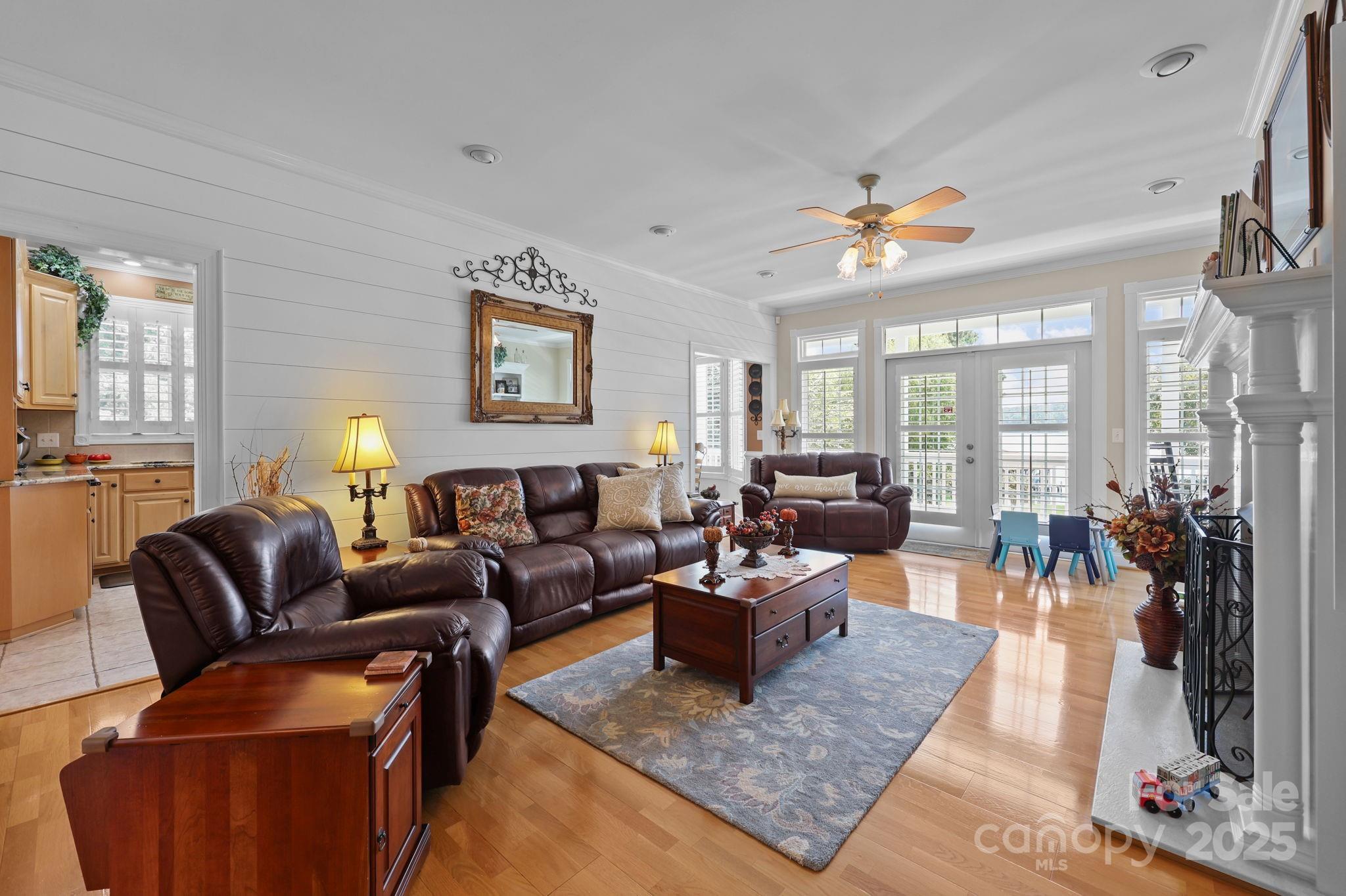 17200 Randalls Ferry Road Norwood, NC 28128 - Photo 20 of 48 a living room with furniture rug and a large window