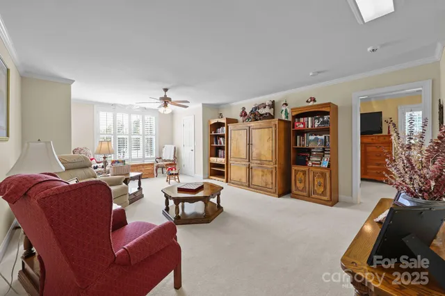 a view of a livingroom with furniture and a couch