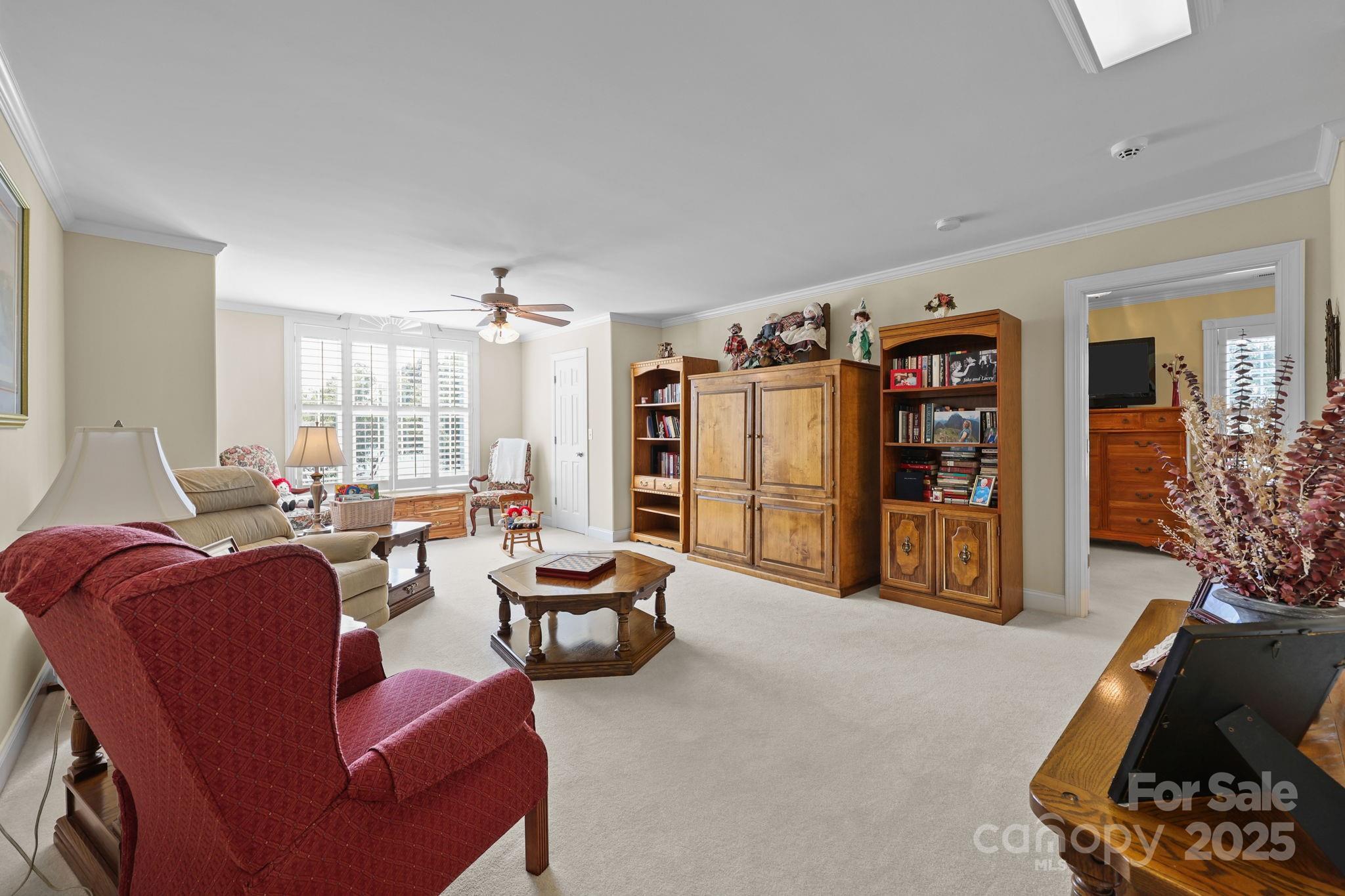 17200 Randalls Ferry Road Norwood, NC 28128 - Photo 26 of 48 a living room with furniture and a flat screen tv