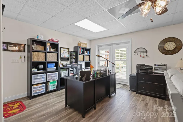 a bathroom with a sink vanity mirror and toilet