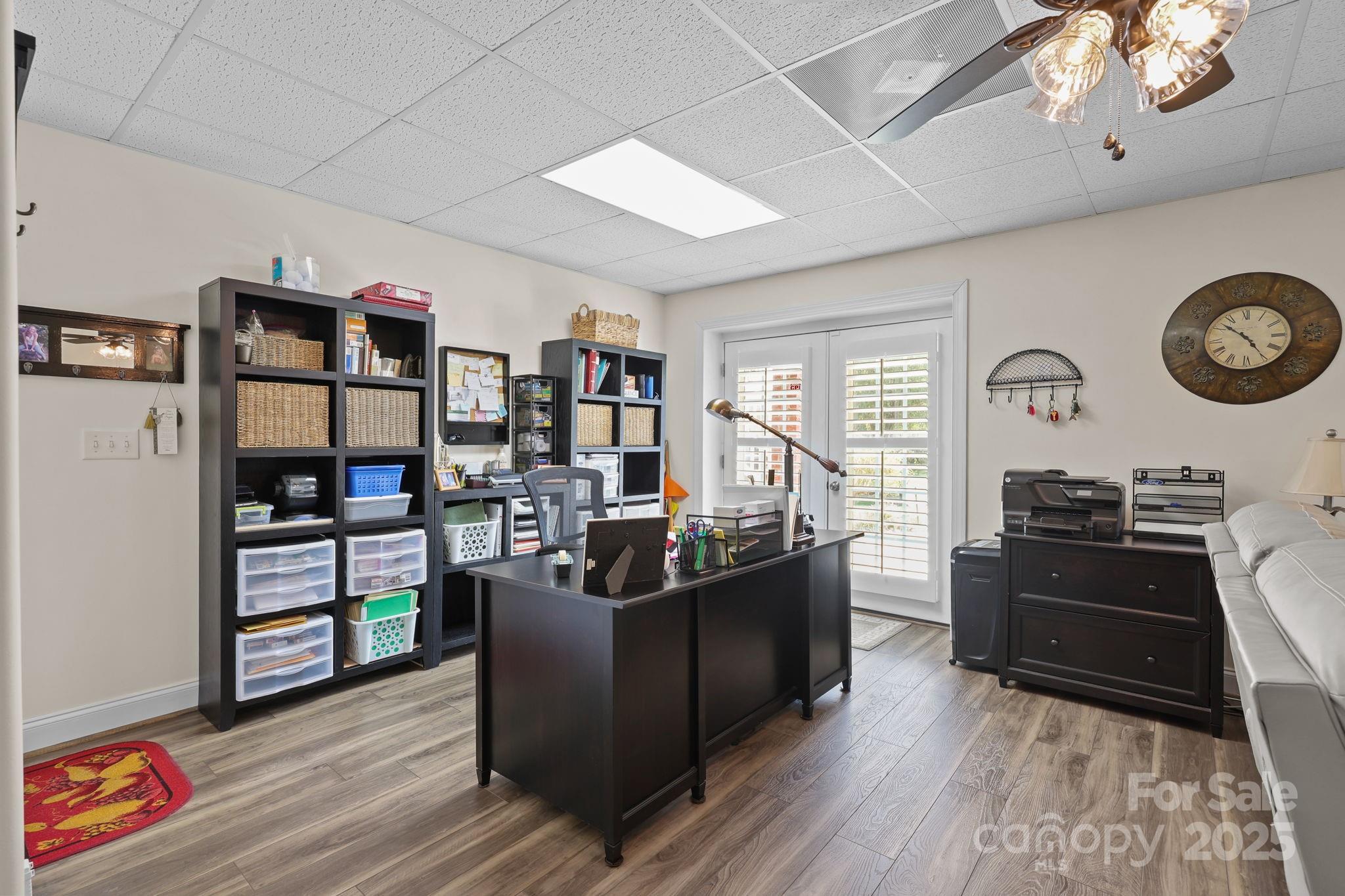 17200 Randalls Ferry Road Norwood, NC 28128 - Photo 34 of 48 a living room with furniture cabinets and wooden floor