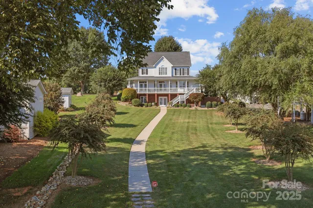 a view of a chairs and table in the patio