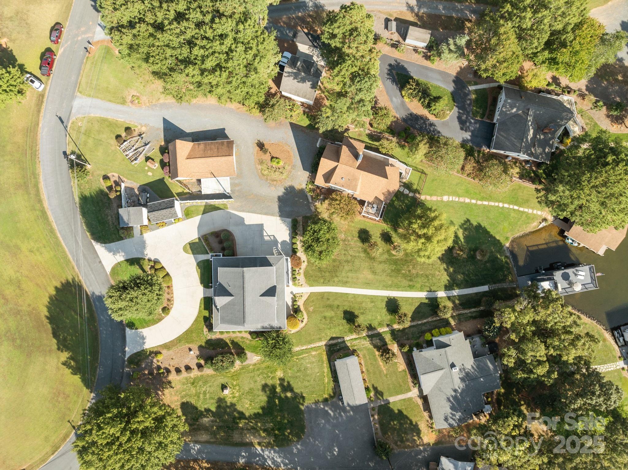 17200 Randalls Ferry Road Norwood, NC 28128 - Photo 4 of 48 an aerial view of a house with swimming pool