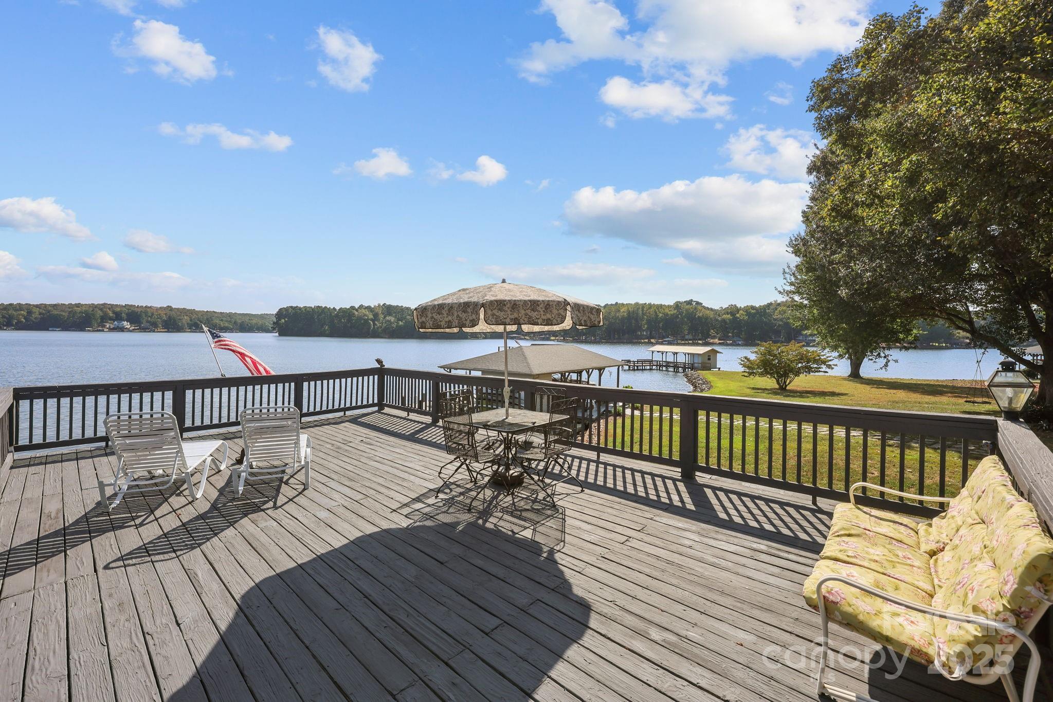 17200 Randalls Ferry Road Norwood, NC 28128 - Photo 41 of 48 a view of balcony with wooden floor and city view