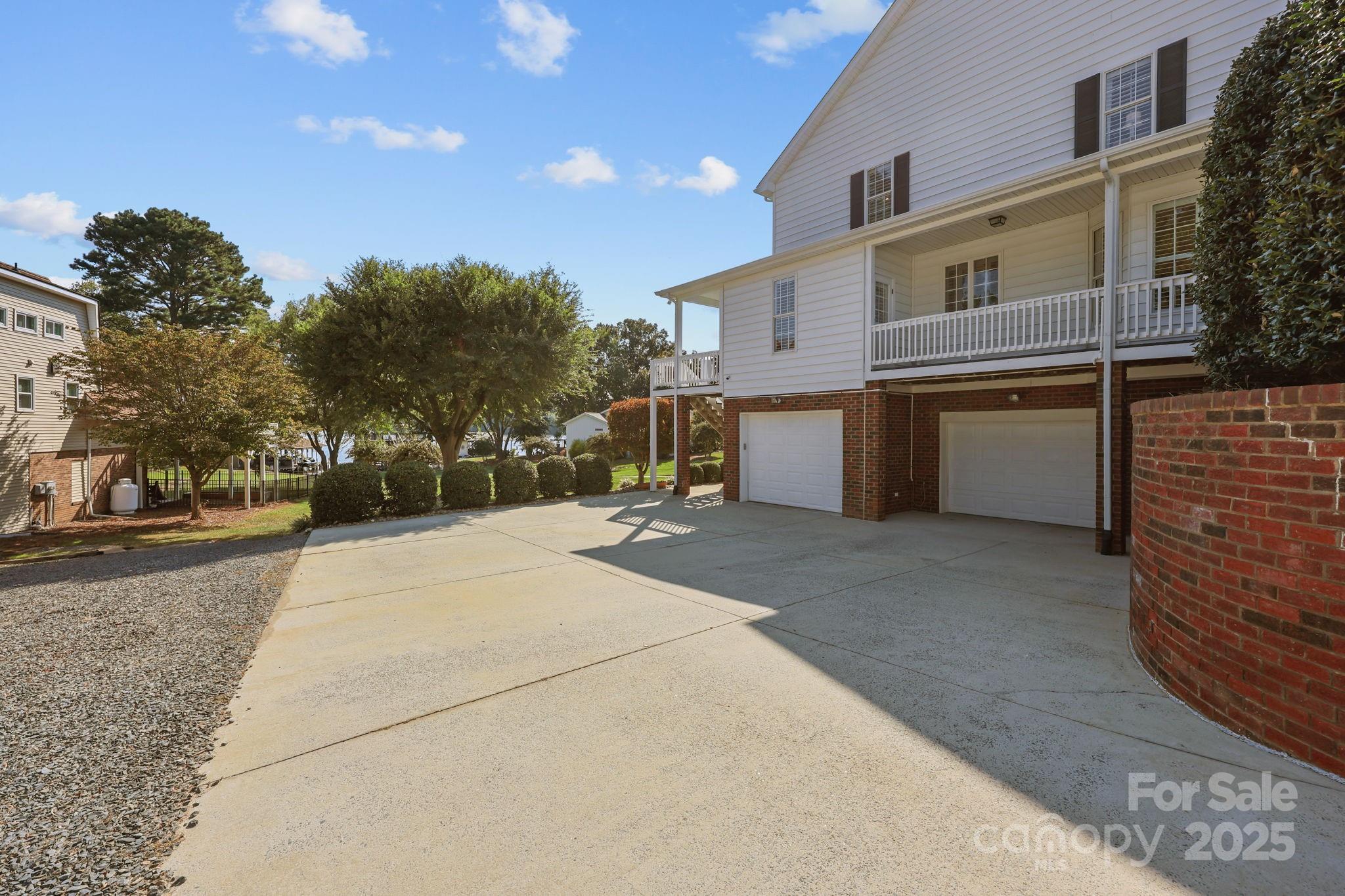 17200 Randalls Ferry Road Norwood, NC 28128 - Photo 42 of 48 a view of a house with a yard