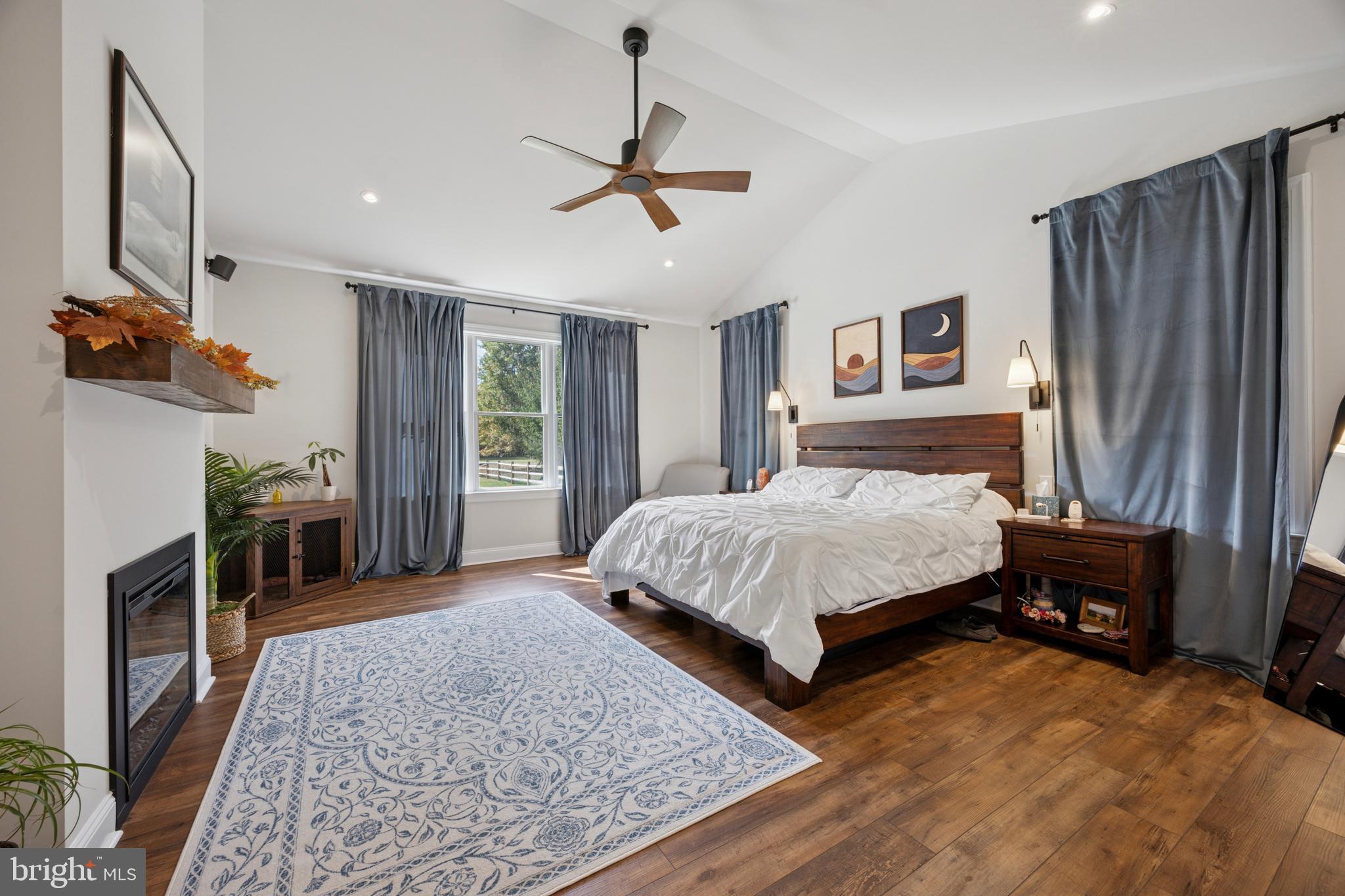 232 South Sugan Road New Hope, PA 18938 - Photo 13 of 31 a bedroom with a bed dresser and a flat tv screen