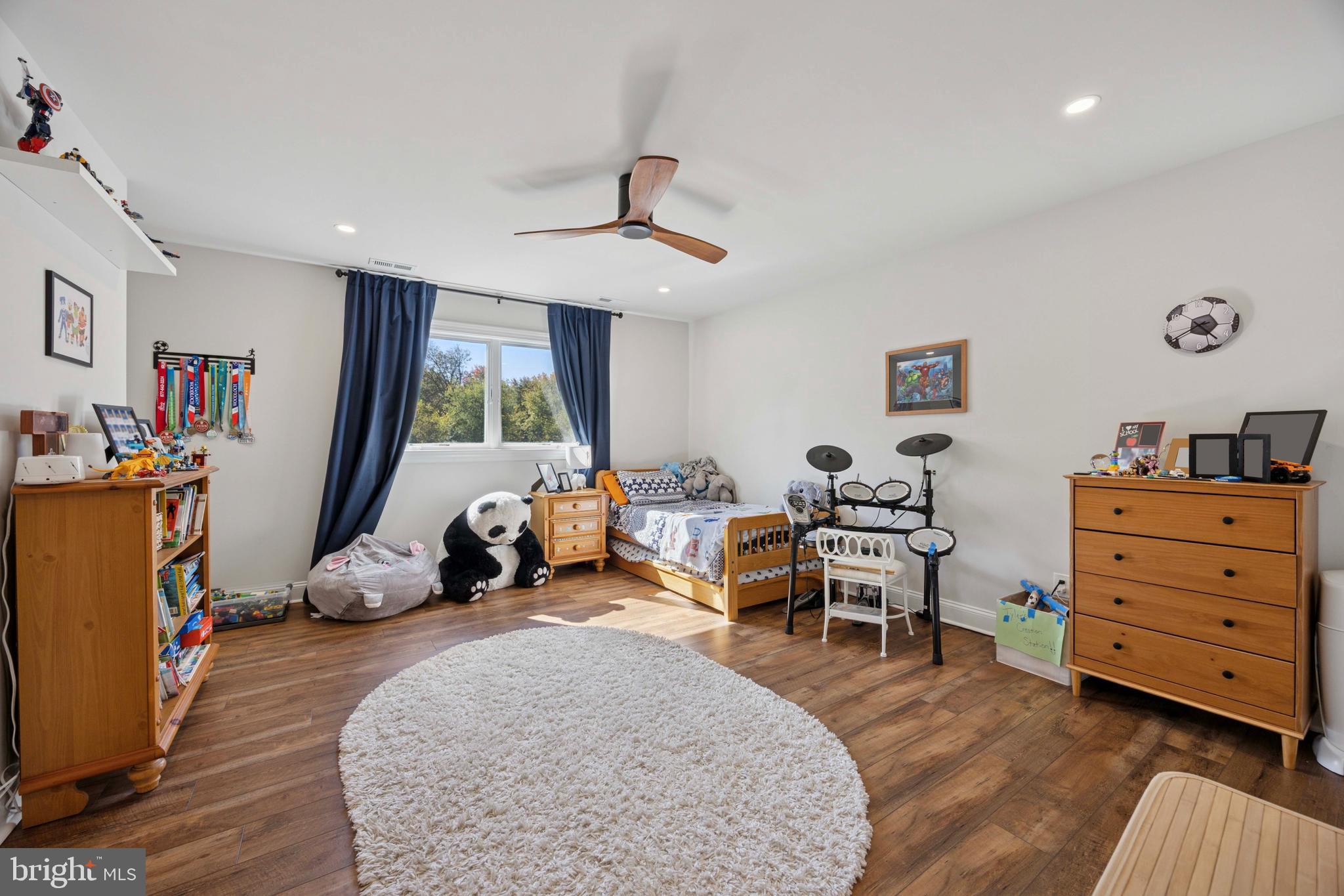 232 South Sugan Road New Hope, PA 18938 - Photo 19 of 31 a living room with furniture a window and gym equipment