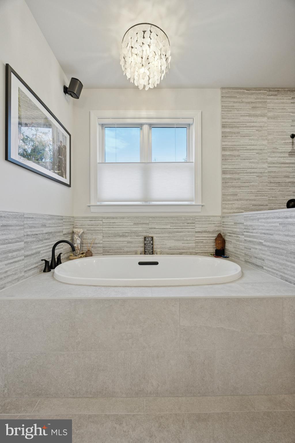 232 South Sugan Road New Hope, PA 18938 - Photo 27 of 31 a bathroom with a tub sink and a mirror