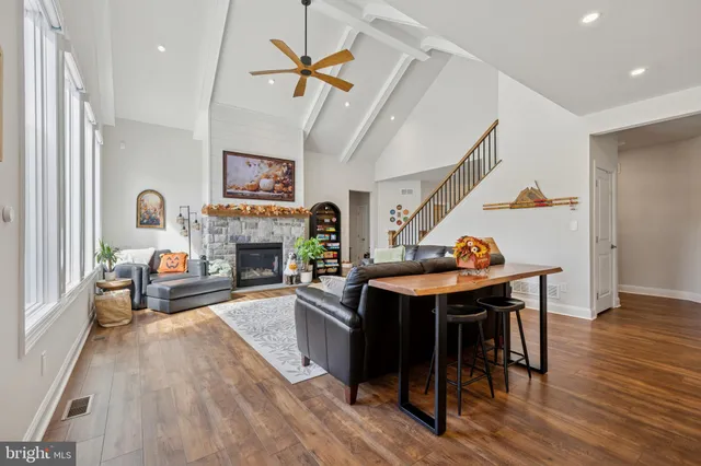 a large kitchen with lots of counter space and windows