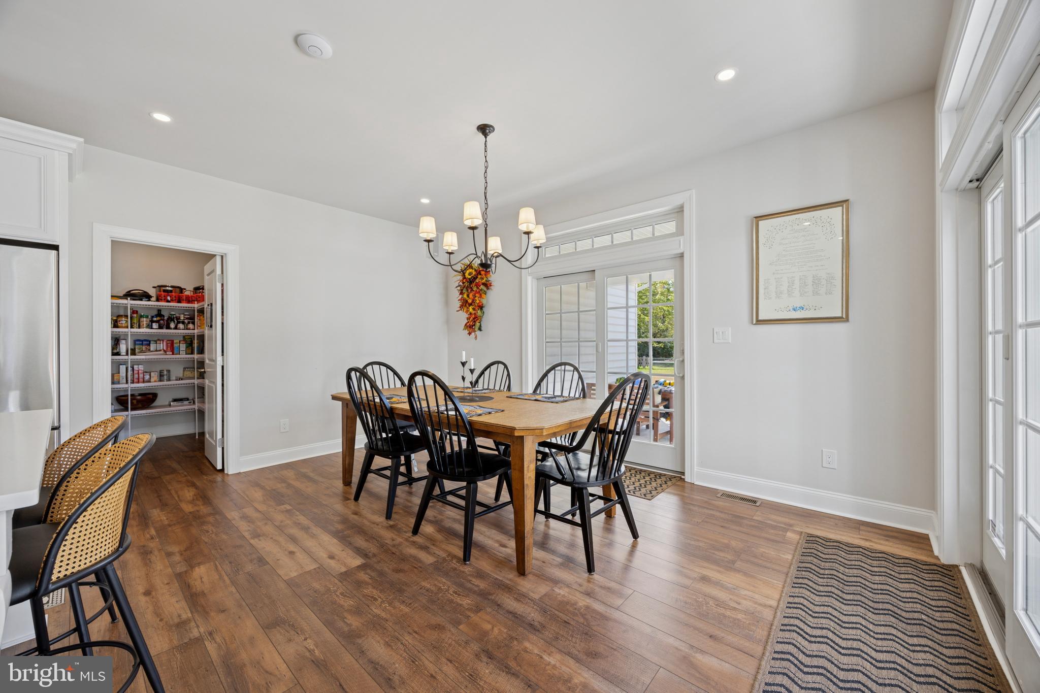 232 South Sugan Road New Hope, PA 18938 - Photo 10 of 31 a view of a dining room with furniture and wooden floor
