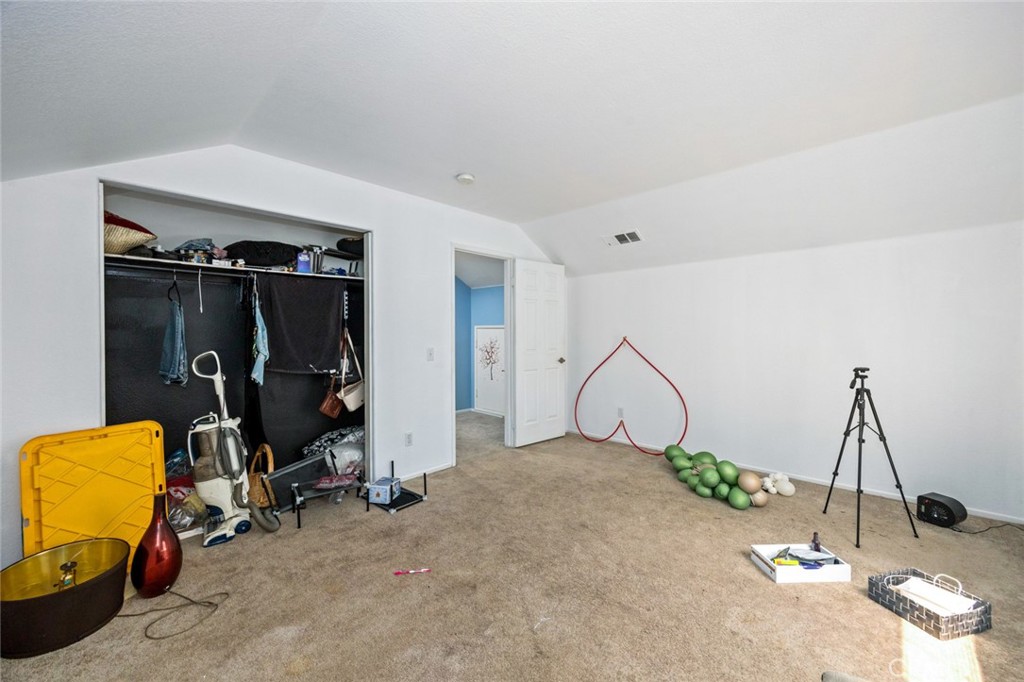 410 Windfields Way Beaumont, CA 92223 - Photo 19 of 41 a view of a room with gym equipment