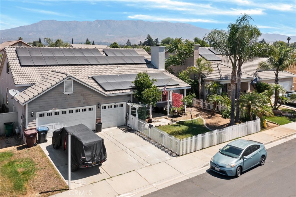 410 Windfields Way Beaumont, CA 92223 - Photo 2 of 41 an aerial view of a house with outdoor space patio