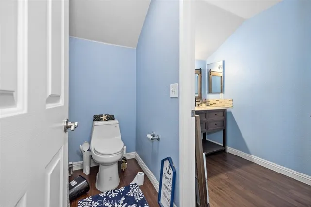 a bathroom with a toilet and a sink