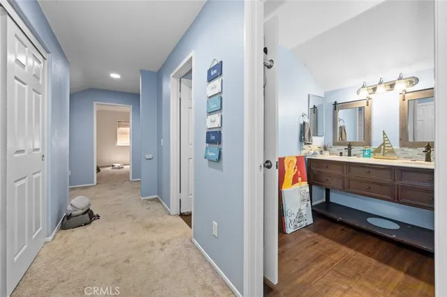 a bathroom with a sink and mirror